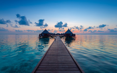 Luxus Resort in the Maldives. Grand sunset over the Indian Ocean. Evening for relaxation and enjoyment. © patma145