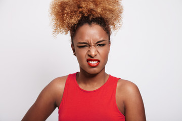 angry black woman screw up her face