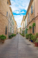 Fototapeta na wymiar Beautiful narrow old street in mediterranean city.