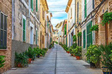 Naklejka premium Beautiful narrow old street in mediterranean city.