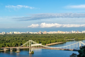 Kiev City, landscape, view of the bridge from above. Beautiful views of the Dnipro River, Texture clouds and foliage.
