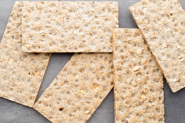 Stack of wholegrain crispy bread with sunflower, chia and sesame