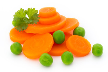 Carrot slice, green peas, isolated on white.