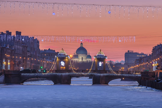 Saint Petersburg Lomonosov Bridge And Trinity Cathedral At Sunse