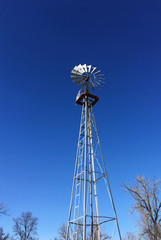 Old-fashioned Windmill and Blue Sky