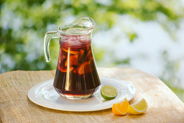 Cool refreshing drink on the background of nature