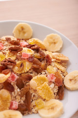 flakes with dried fruit, granola on the plate
