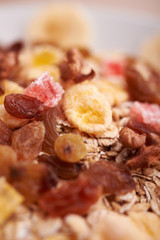 flakes with dried fruit, granola on the plate