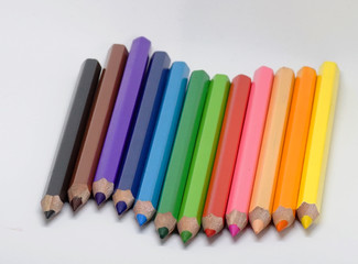 Fototapeta premium children colorful color pencil on isolated white background