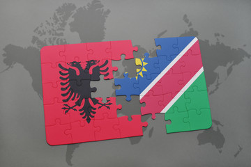 puzzle with the national flag of albania and namibia on a world map