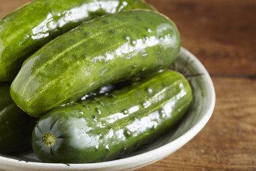 a bowl of classic New York style half-sour pickles