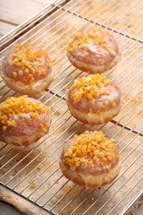 Traditional Polish donuts with orange