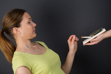 Obraz premium smoking concept on black background