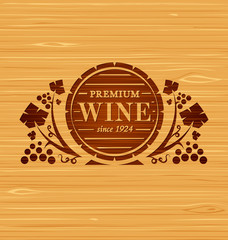 Vector wine emblem with grape bunches and grape leaves on a wooden background - 134528333