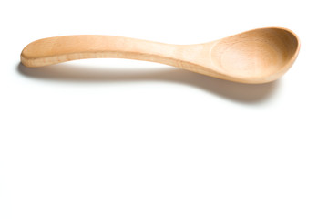 A wooden spoon isolated over white background