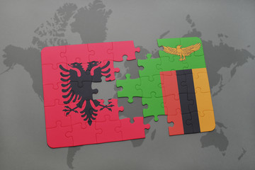 puzzle with the national flag of albania and zambia on a world map