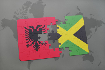 puzzle with the national flag of albania and jamaica on a world map