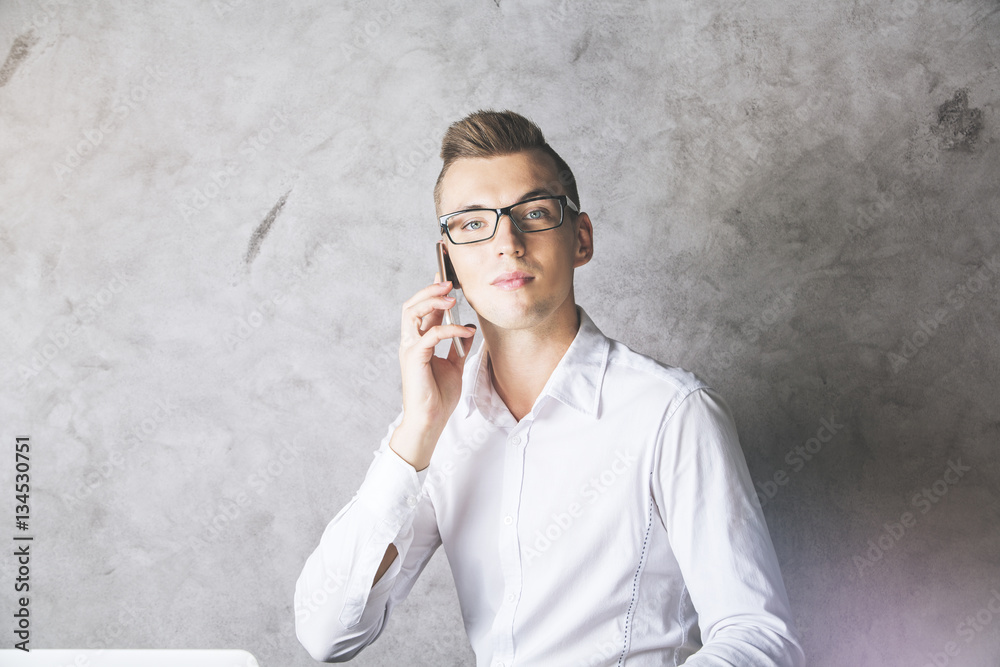 Poster Young businessman on phone