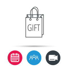 Gift shopping bag icon. Present handbag sign. Group of people, video cam and calendar icons. Vector