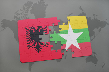 puzzle with the national flag of albania and myanmar on a world map