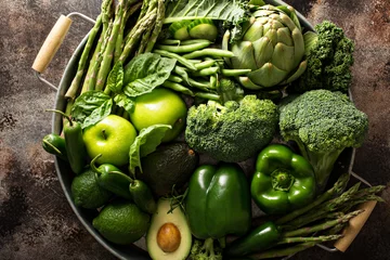Fotobehang Variety of green vegetables and fruits © fahrwasser