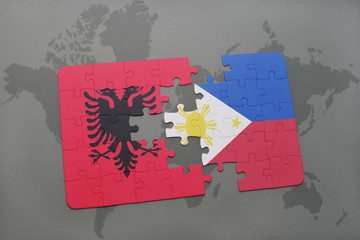 puzzle with the national flag of albania and philippines on a world map