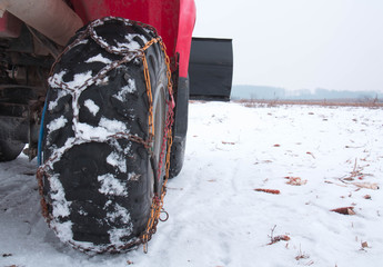Wheel of a quad/atv with chains on snow