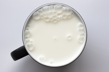 top view of glass milk / Glass of Milk From Above / gray tone