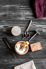 Tools for cutting beard barbershop top view on wooden background