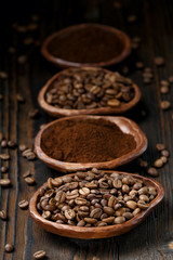 Coffee beans and instant coffee on a wooden desk