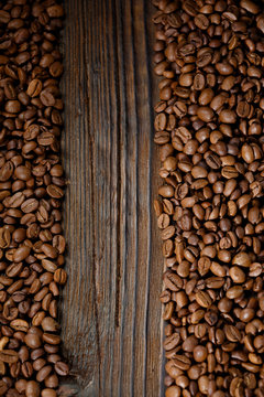 Coffee beans on a wooden desk