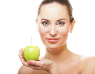 Young happy smiling woman with green apple