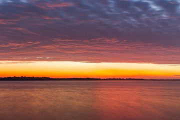 Fototapeta premium Landscape of sunrise over dam in Thailand