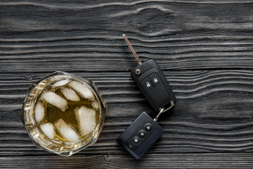 concept of alcohol and driving on wooden background top view