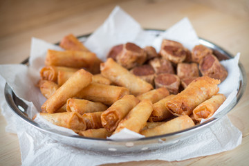 Deep fried spring rolls and deep fried chicken rolls