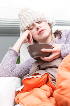 Ill Woman Drinking A Hot Broth