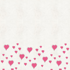 Floating pink hearts on grunge cream canvas background