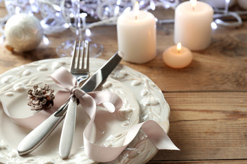 Beautiful Christmas table setting with decorations