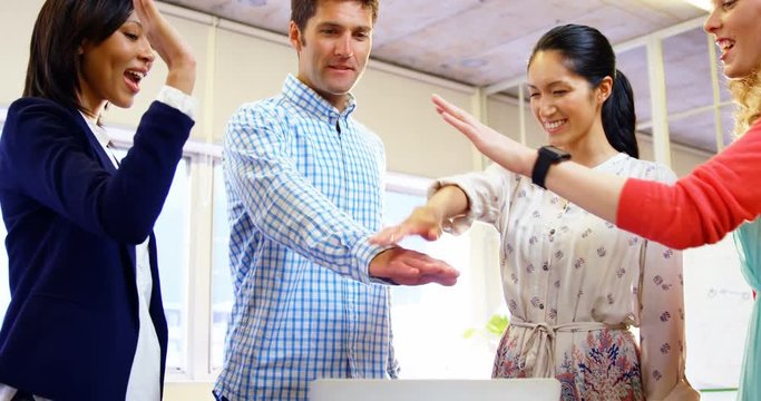 Group of happy business executives with hand stack in office 4k