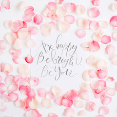 Be bright. Be happy. Be you. Inspirational quote made with calligraphy and floral pattern with pink...