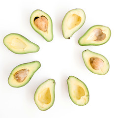 Sliced raw avocado arrangement. Flat lay, top view. Creative food concept