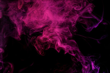 Abstract smoke Weipa. Personal vaporizers fragrant steam. The concept of alternative non-nicotine smoking. Lilac smoke on a black background. E-cigarette. Evaporator. Taking Close-up. Vaping.