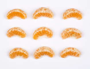 Top view of peeled mandarin isolated on white background.