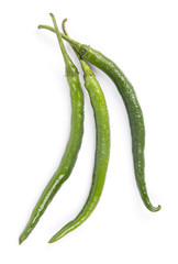 Fresh green peppers on white background.