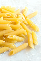Raw uncooked pasta penne