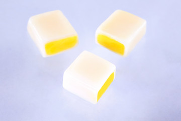 caramel fruity candies on white