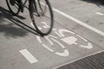 Fototapeta na wymiar Bike Symbol and Cyclist, Den Haag - the Hague; Holland
