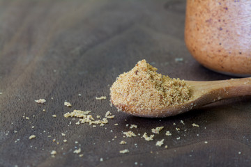 Brown Sugar in Wooden Spoon