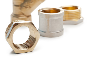 Set of metal-plastic plumbing couplings, adapters, plugs isolated on white background