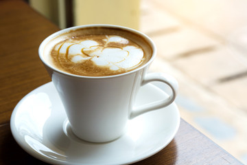 White Coffee Cup on Wood Desk in Morning